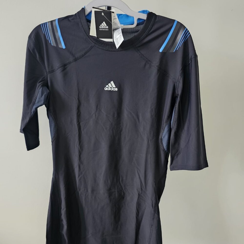 Adidas- T-SHIRT. Size L Color black with blue details and lines. NWT